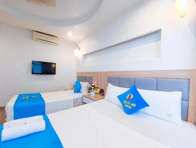 Deluxe Family Room — Khách sạn Thế Kỷ Mới